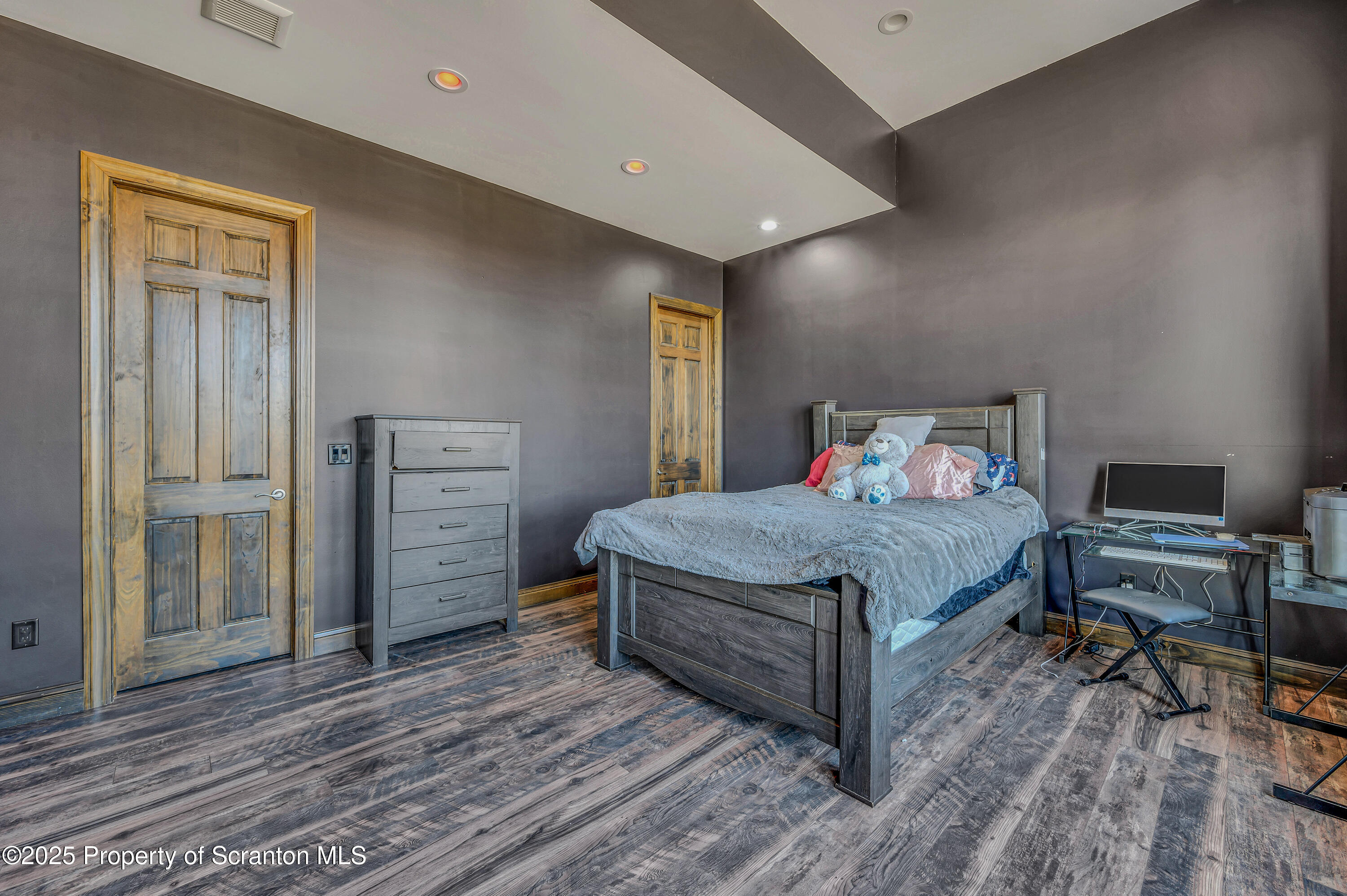 815 Oak Street Archbald, PA 18403 - Photo 66 of 85 a bedroom with a bed and a desk