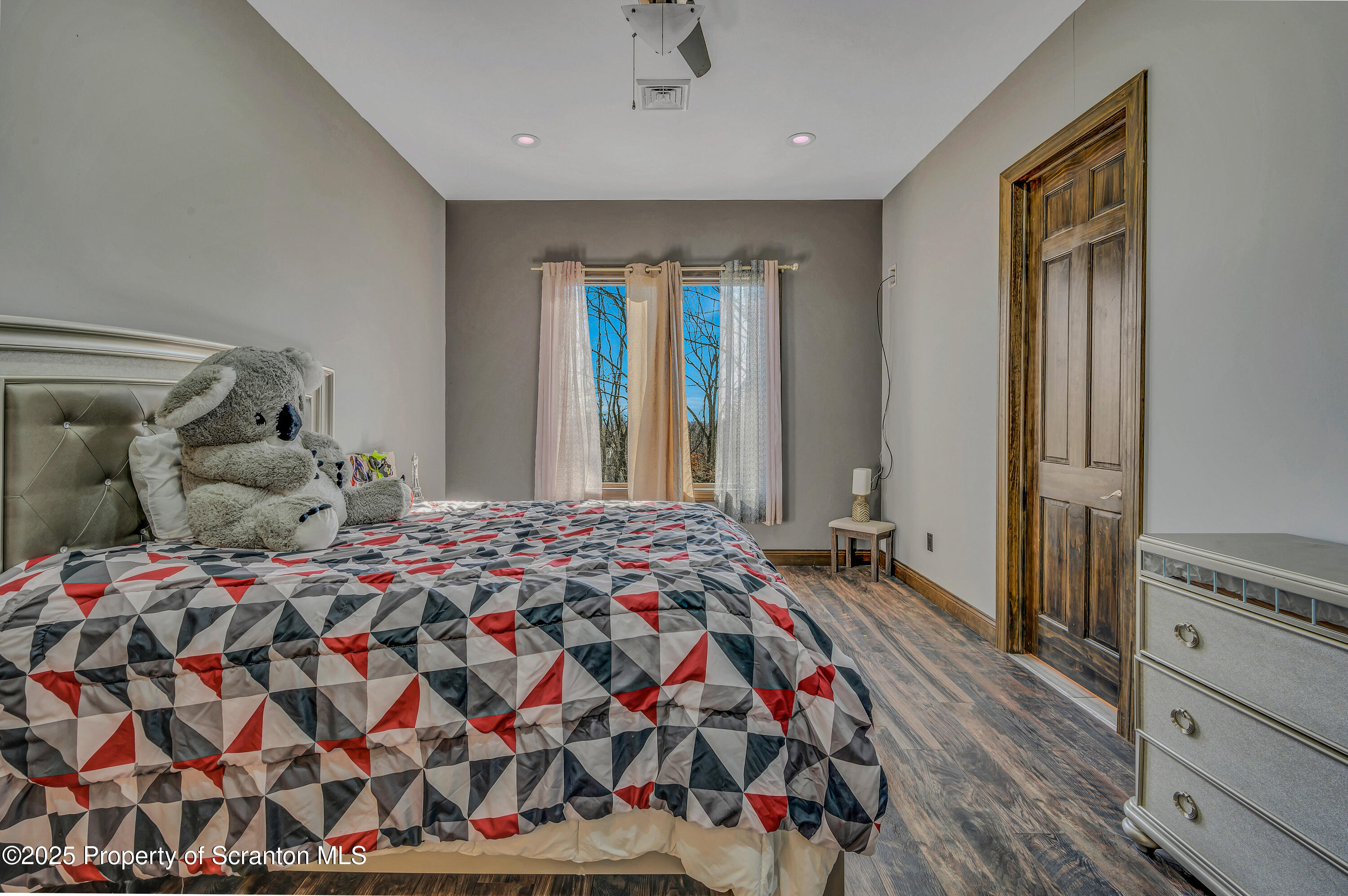 815 Oak Street Archbald, PA 18403 - Photo 75 of 85 a bedroom with a bed and a window