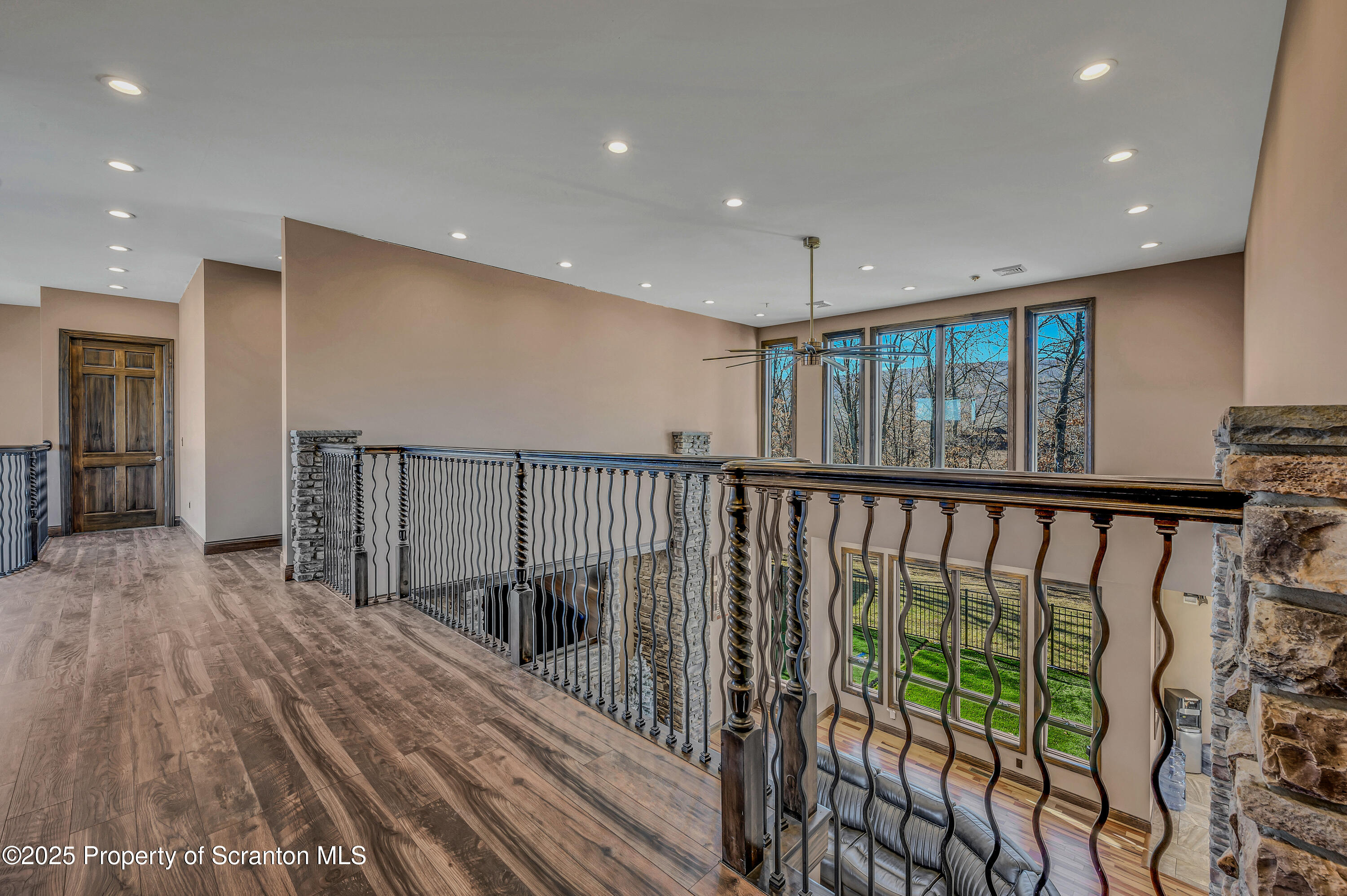 815 Oak Street Archbald, PA 18403 - Photo 80 of 85 a view of a hallway with wooden floor