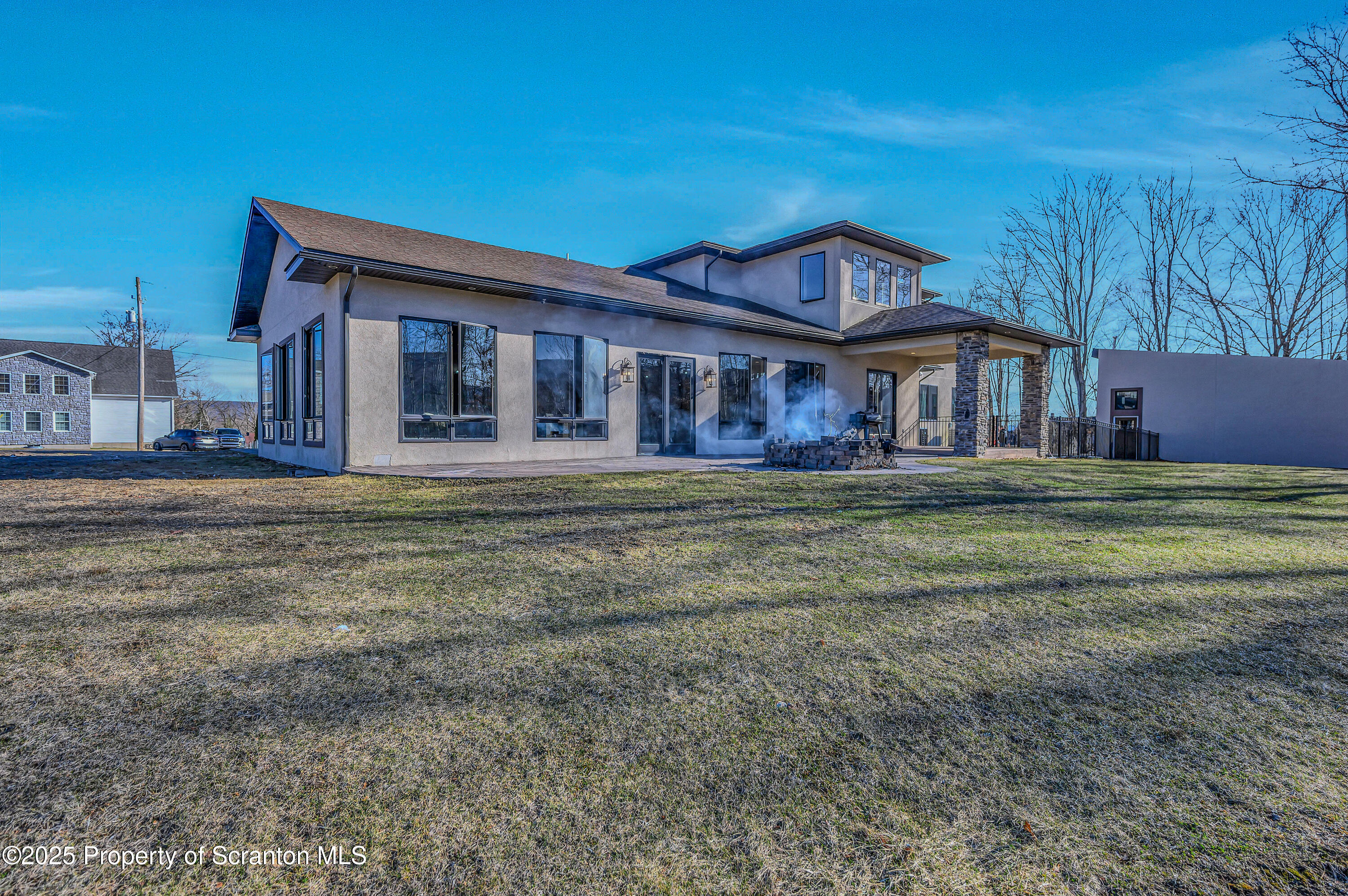 815 Oak Street Archbald, PA 18403 - Photo 9 of 85 a front view of a house with a yard