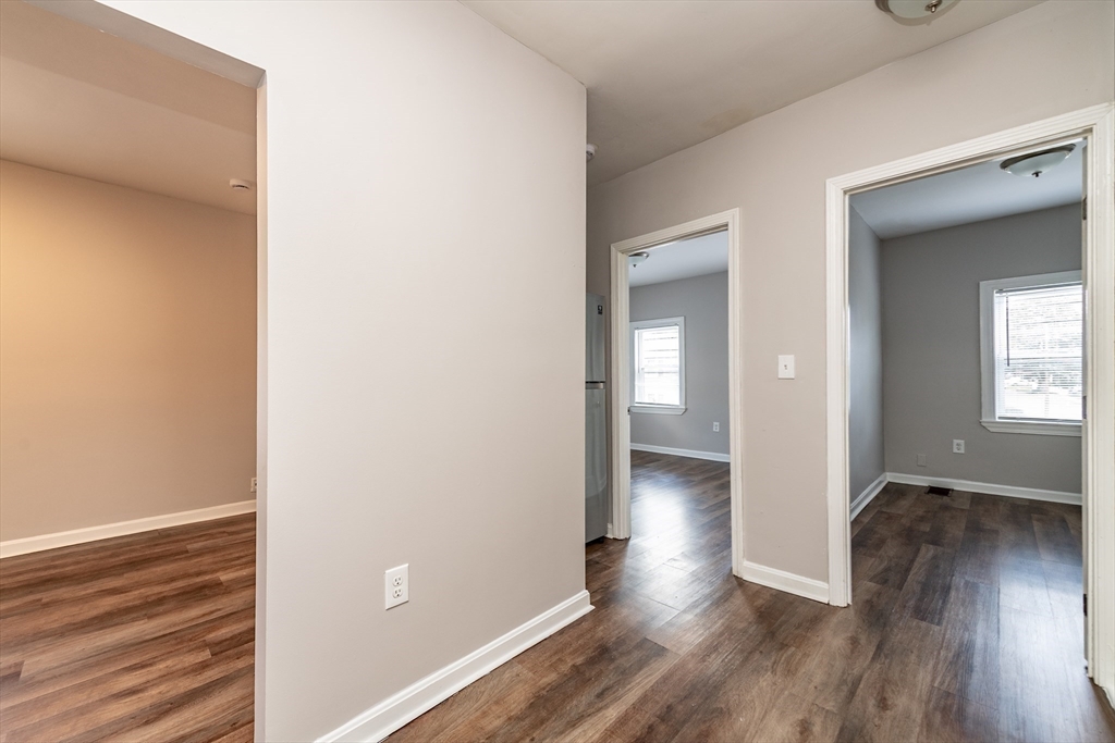 266-274 River Street Waltham, MA 02453 - Photo 18 of 27 a view of a hallway with wooden floor