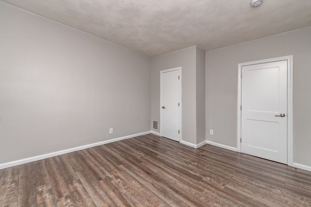 266-274 River Street Waltham, MA 02453 - Photo 8 of 27 a view of room with wooden floor