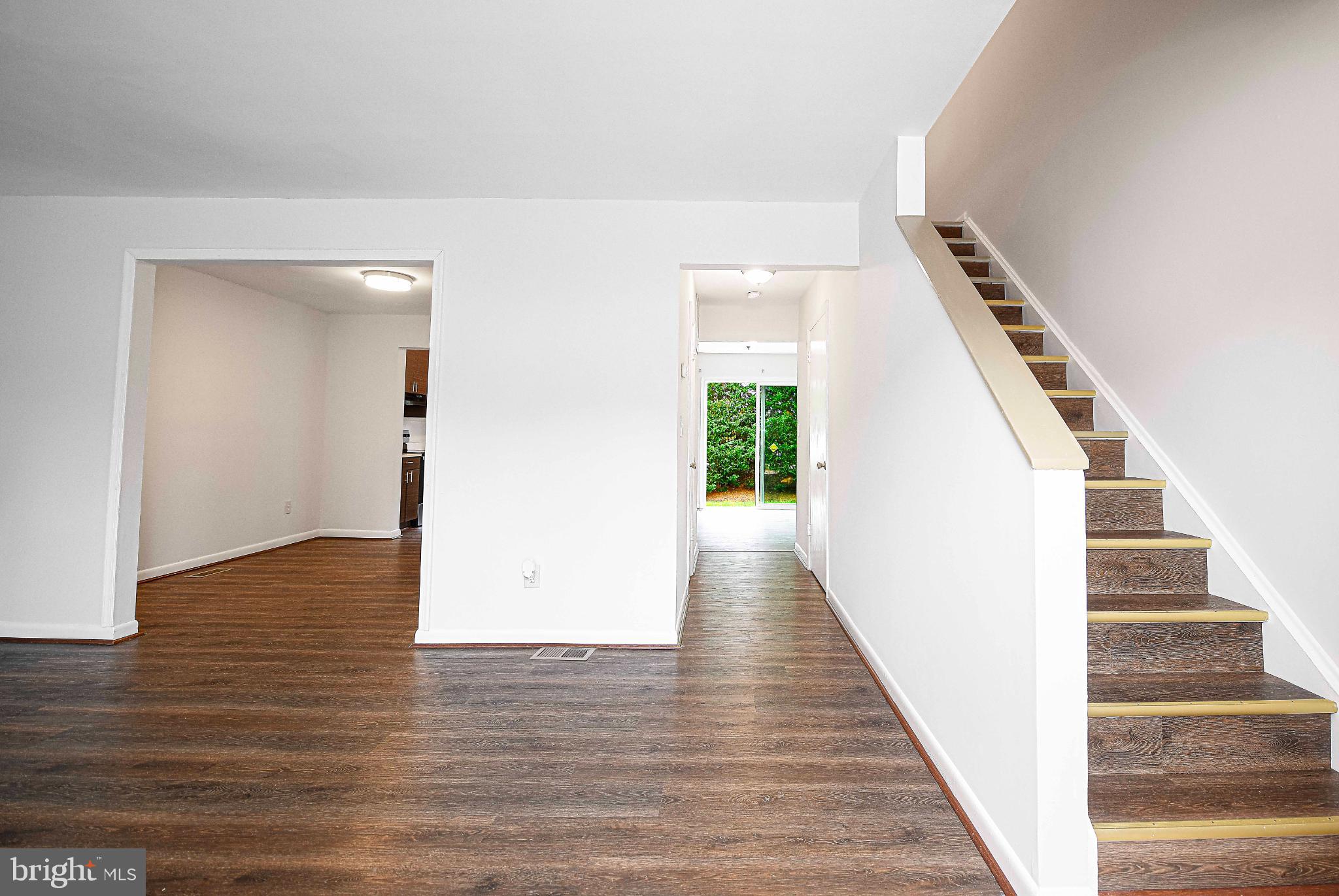 7105 Rutherford Green Circle Windsor Mill, MD 21244 - Photo 2 of 30 a view of an entryway with wooden floor