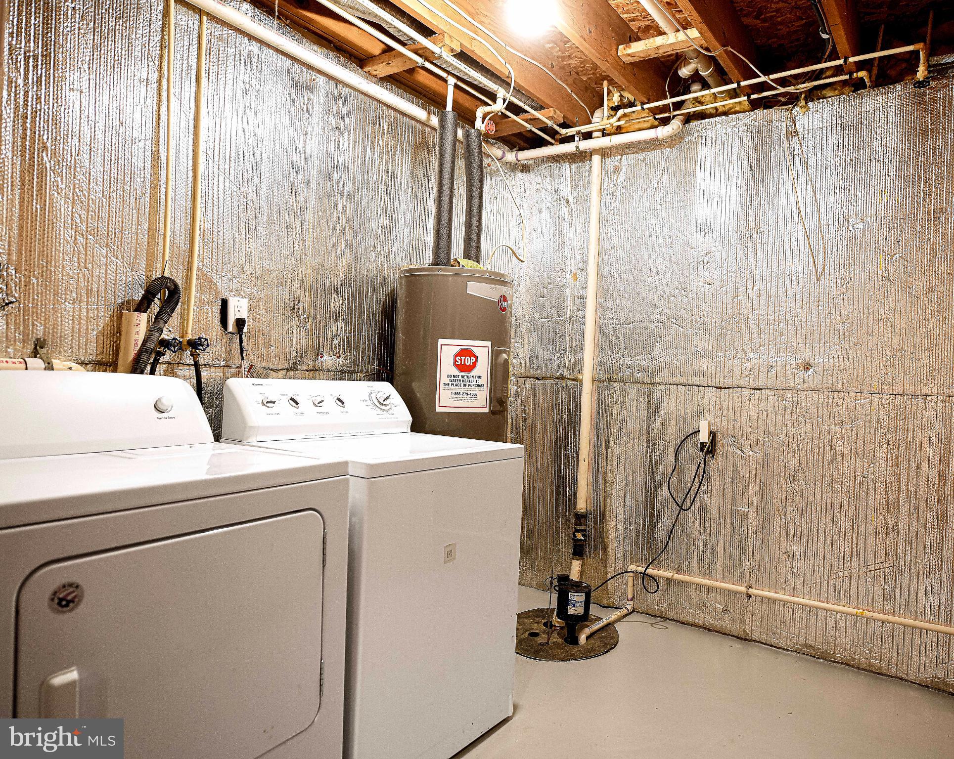 7105 Rutherford Green Circle Windsor Mill, MD 21244 - Photo 24 of 30 a utility room with dryer and washer