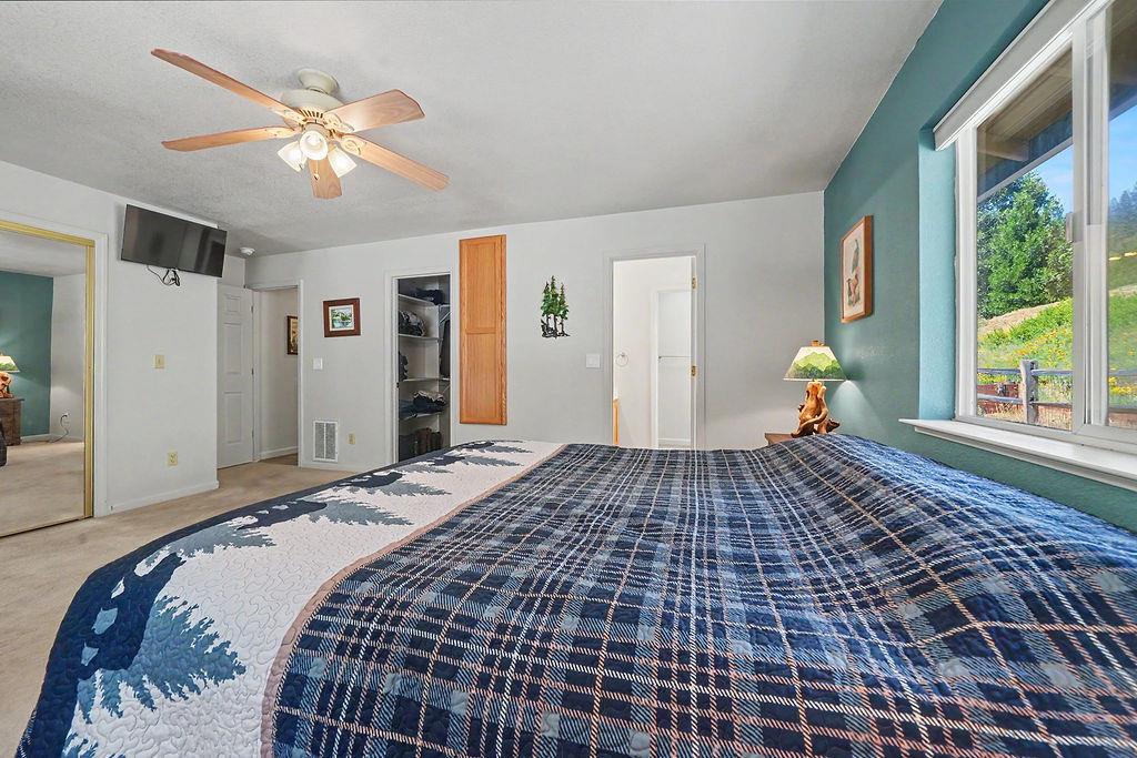 26845 Spring Court Pioneer, CA 95666 - Photo 36 of 89 a bedroom with a bed and window