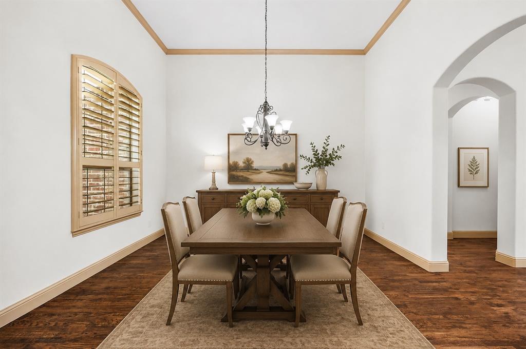 6814 Springwood Lane Garland, TX 75044 - Photo 6 of 35 a dining room with furniture and wooden floor