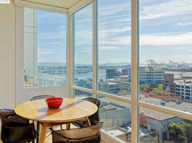 a view of a dining room with furniture window and outside view