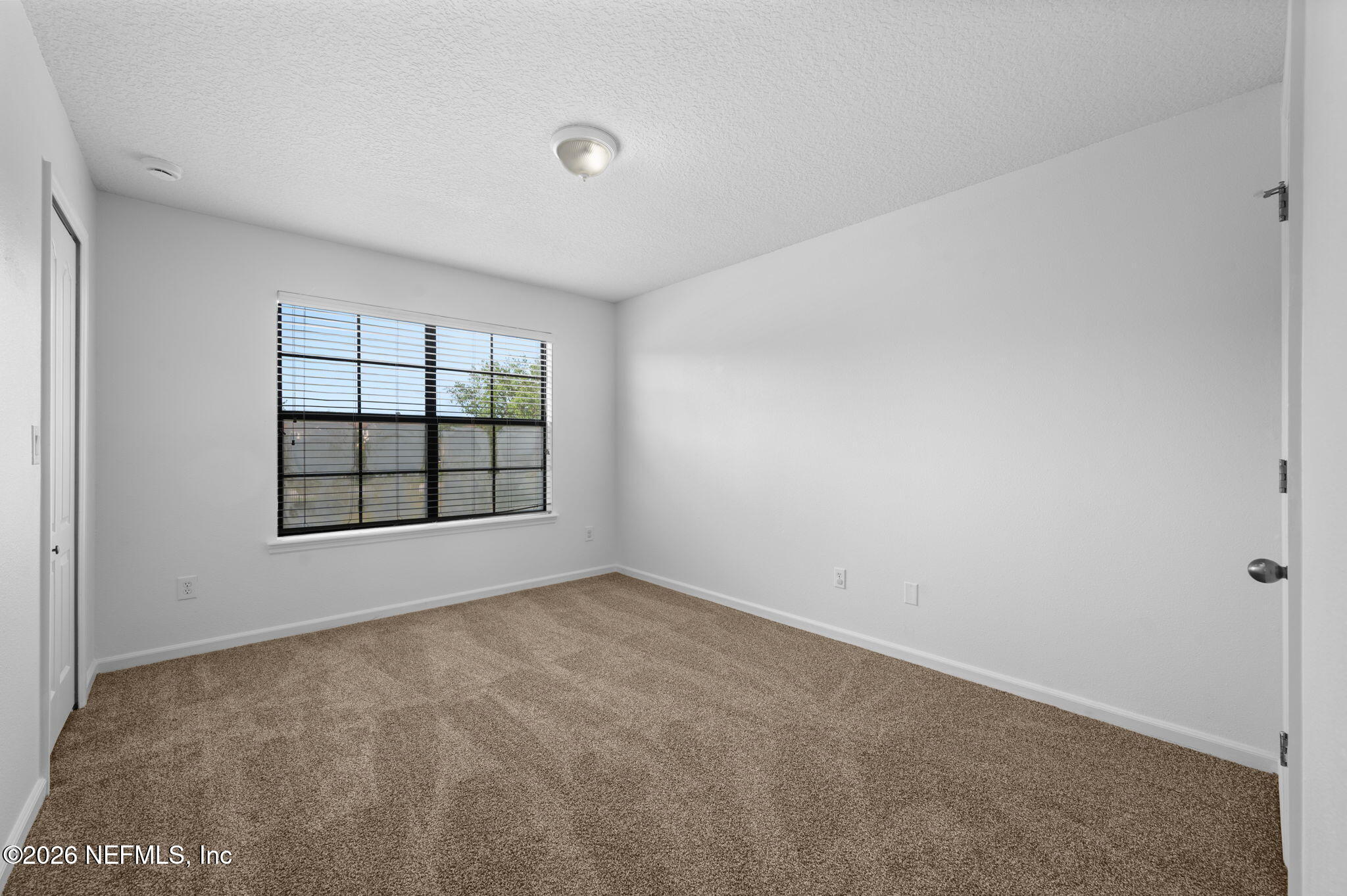 253 Syrah Way St. Augustine, FL 32084 - Photo 20 of 39 an empty room with windows
