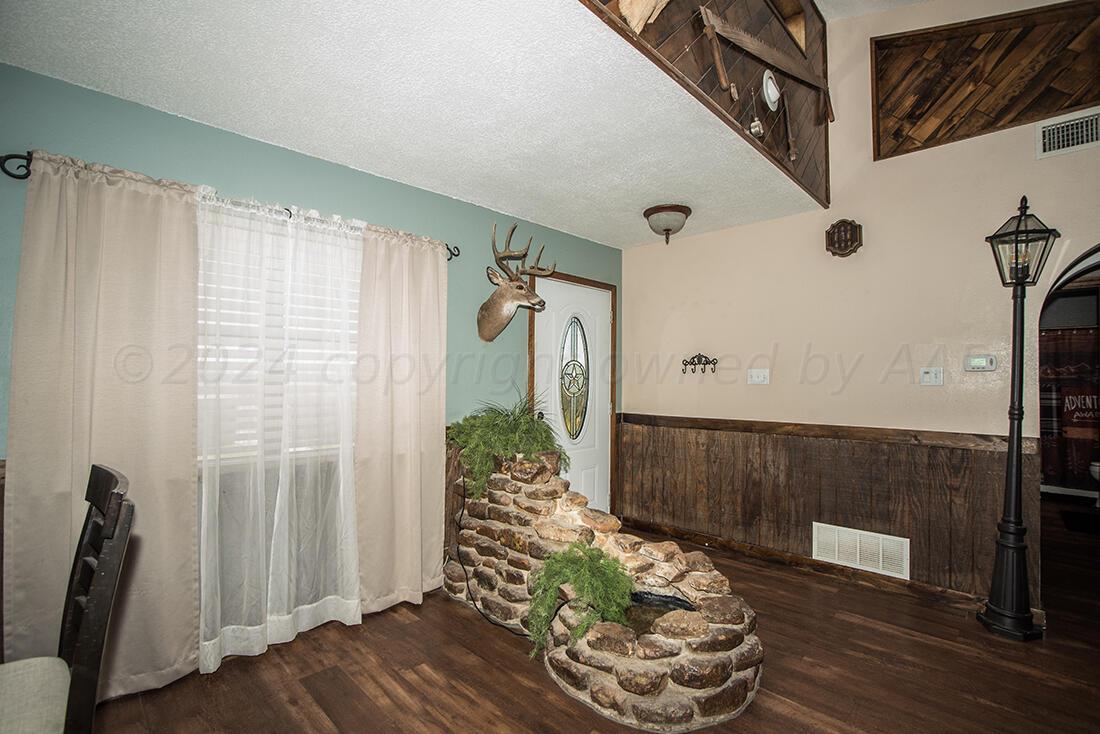 303 Cedar Fritch, TX 79036 - Photo 11 of 44 a living room with furniture
