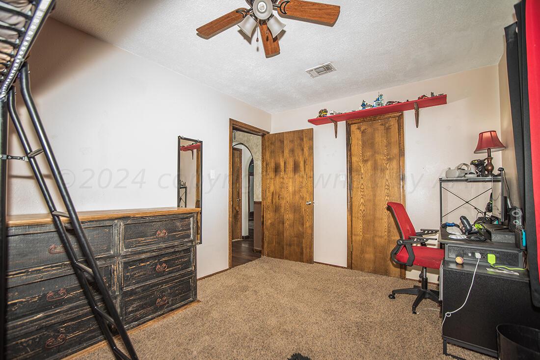 303 Cedar Fritch, TX 79036 - Photo 26 of 44 a view of a room with gym equipment