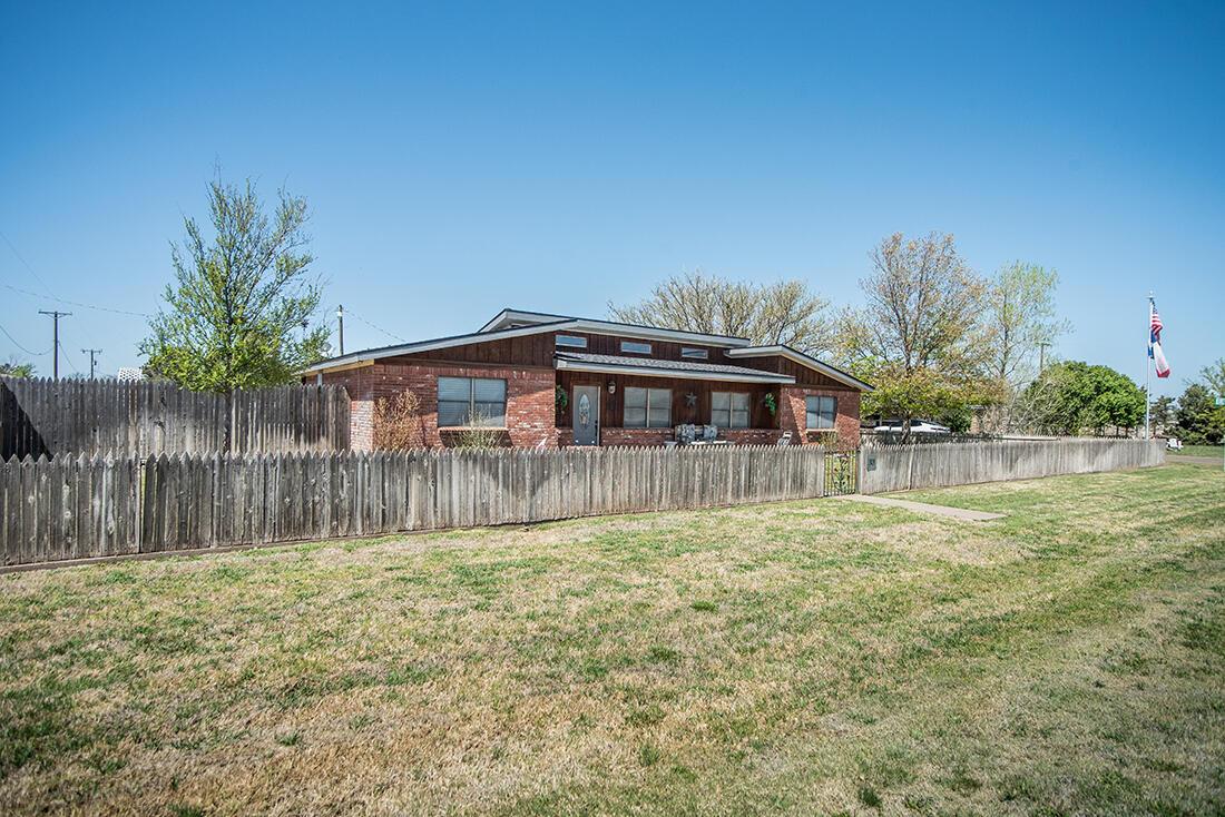 303 Cedar Fritch, TX 79036 - Photo 4 of 44 a house view with a outdoor space