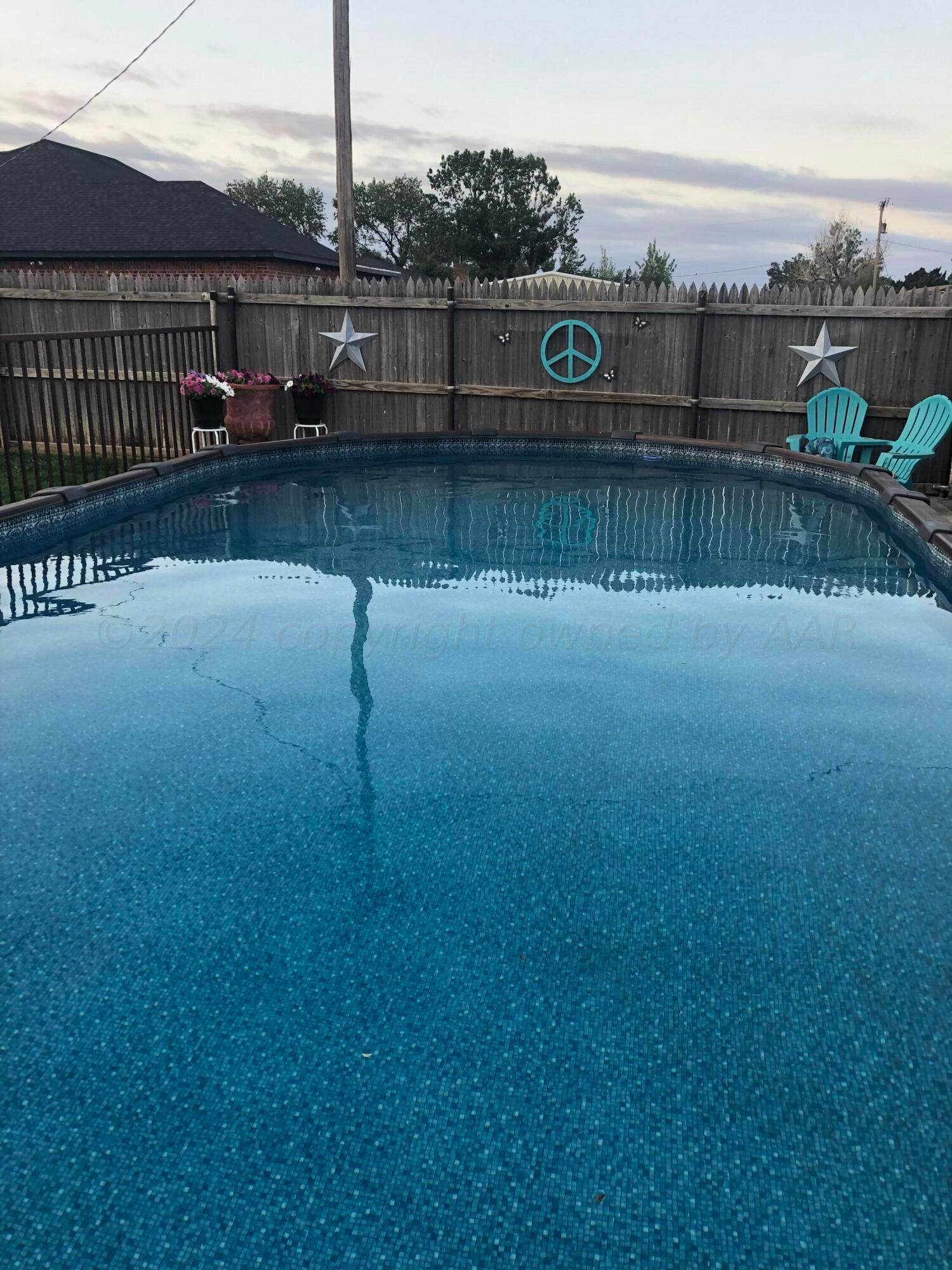 303 Cedar Fritch, TX 79036 - Photo 44 of 44 a view of a lake with a bridge