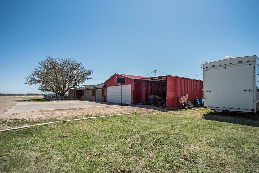 303 Cedar Fritch, TX 79036 - Photo 10 of 44 a house with a yard