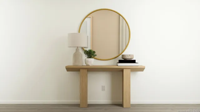 a room with a table and potted plants