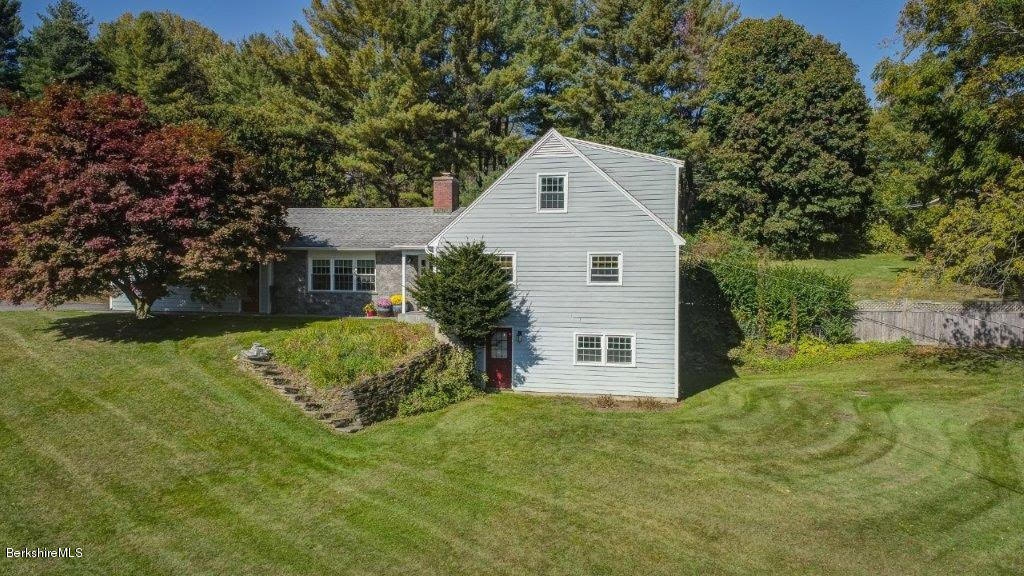 45 Buxton Hill Road Williamstown, MA 01267 - Photo 19 of 21 a front view of a house with a yard