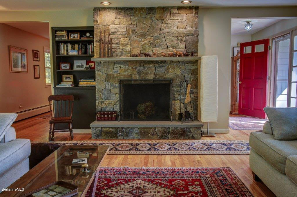 45 Buxton Hill Road Williamstown, MA 01267 - Photo 3 of 21 a living room with furniture and a fireplace