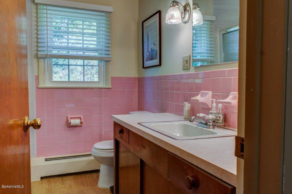 45 Buxton Hill Road Williamstown, MA 01267 - Photo 7 of 21 a bathroom with a sink a mirror and a window