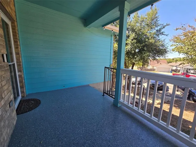 a view of a backyard of the house