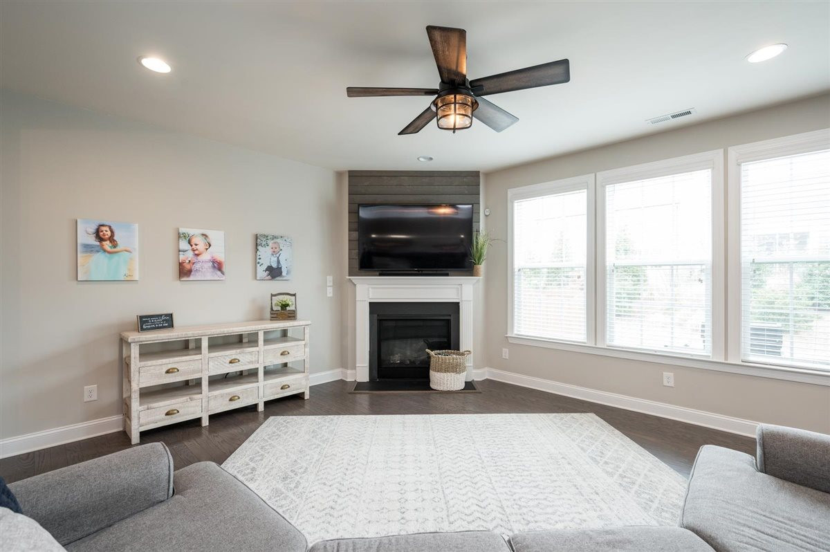 409 Morgan Ridge Road Holly Springs, NC 27540 - Photo 6 of 30 Enjoy a spacious living room that opens to dining area and large, eat-in kitchen Living Room