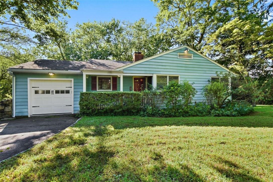 818 King Street Rye Brook, NY 10573 - Photo 1 of 1 a front view of a house with a yard