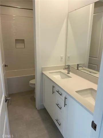 a view of cabinets with sink