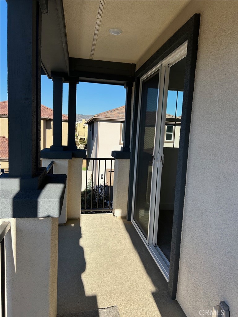 168 Carmine Irvine, CA 92618 - Photo 22 of 26 a view of balcony with wooden floor and furniture