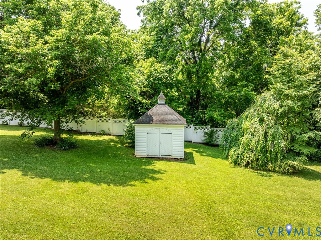 23 Courthouse Road Buckingham, VA 23921 - Photo 50 of 52 a white house with a big yard and large trees