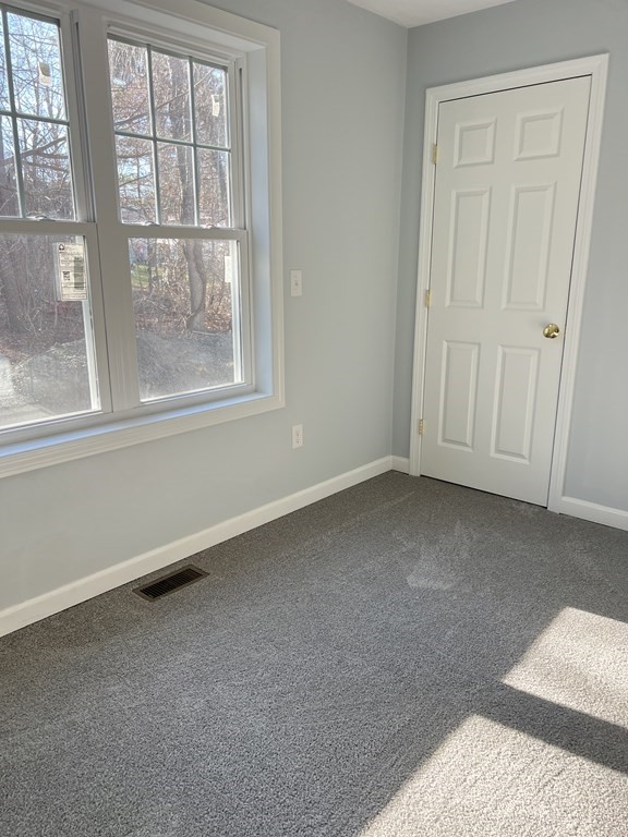 16 B Taunton Street Worcester, MA 01604 - Photo 12 of 12 an empty room with windows