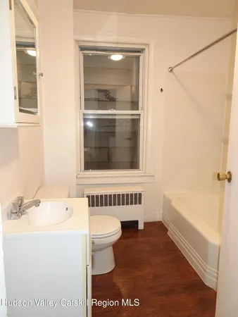 a bathroom with a sink and a bathtub