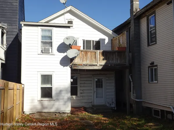 a front view of a house with a porch