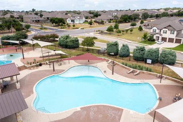 an aerial view of a swimming pool