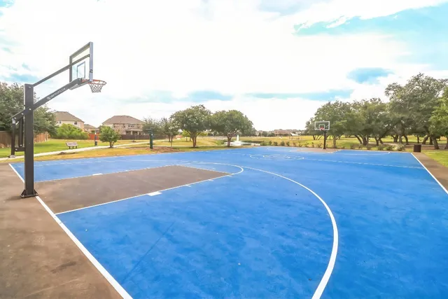 a view of a swimming pool and an ocean