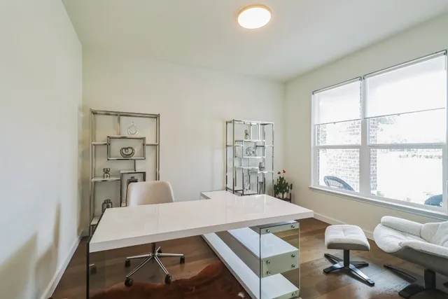 a view of a dining room with furniture window and outside view