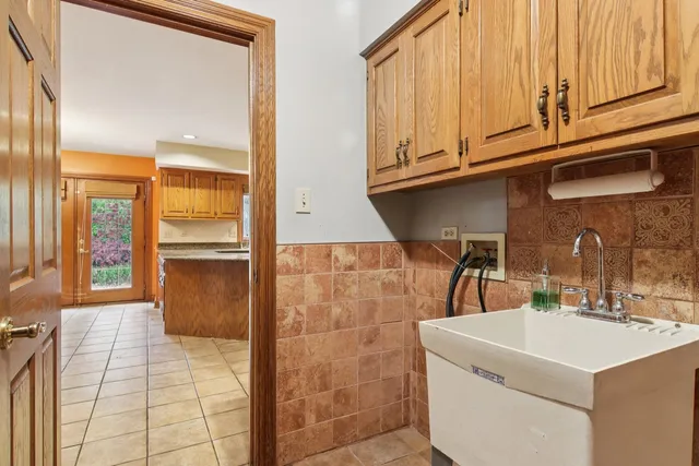 a view of an empty room with glass door