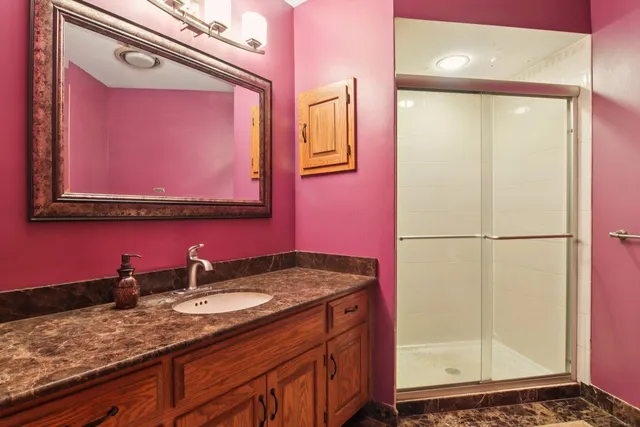 a view of a hallway with windows