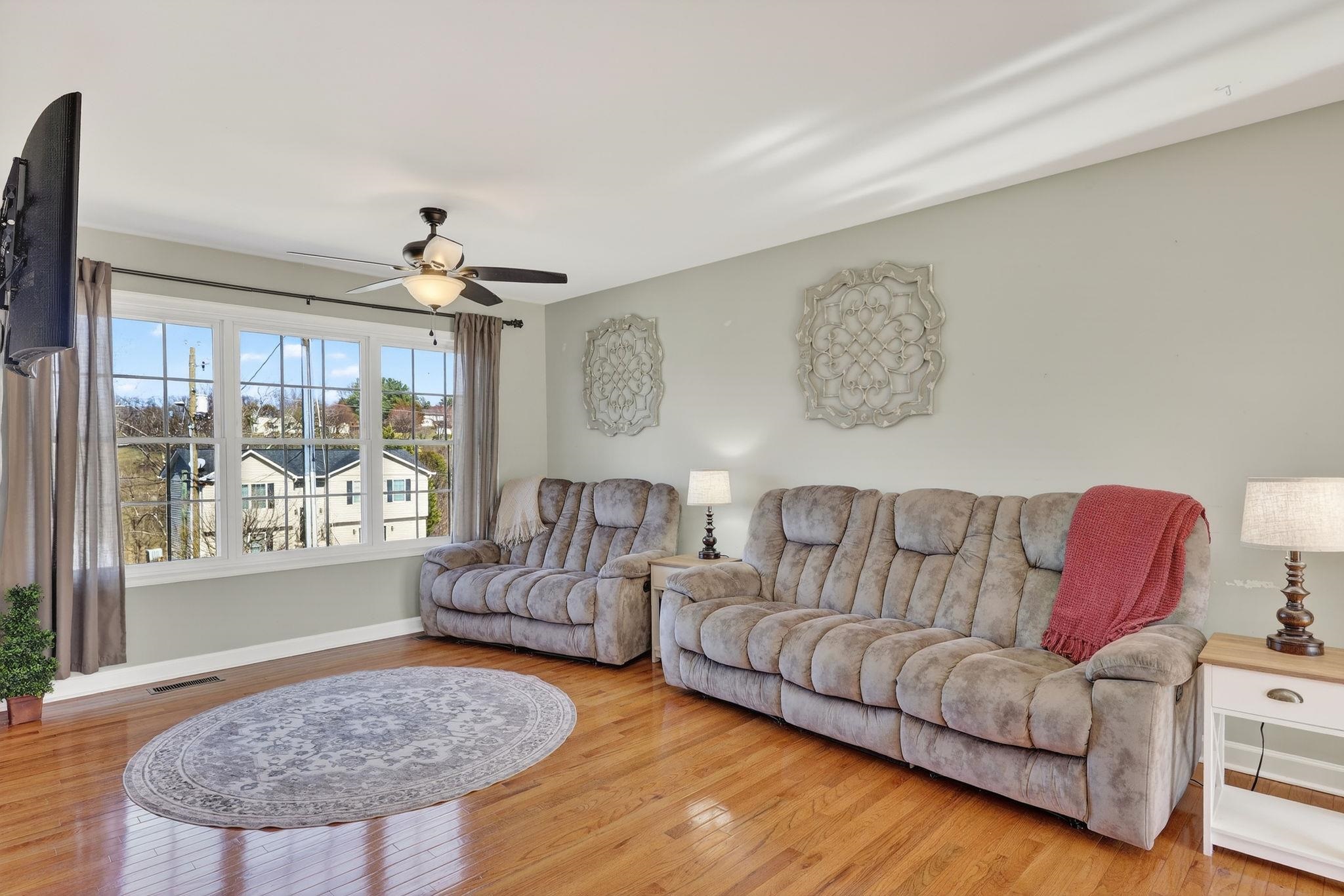 235 Locustdale Loop Shenandoah, VA 22849 - Photo 2 of 30 a living room with furniture and a large window