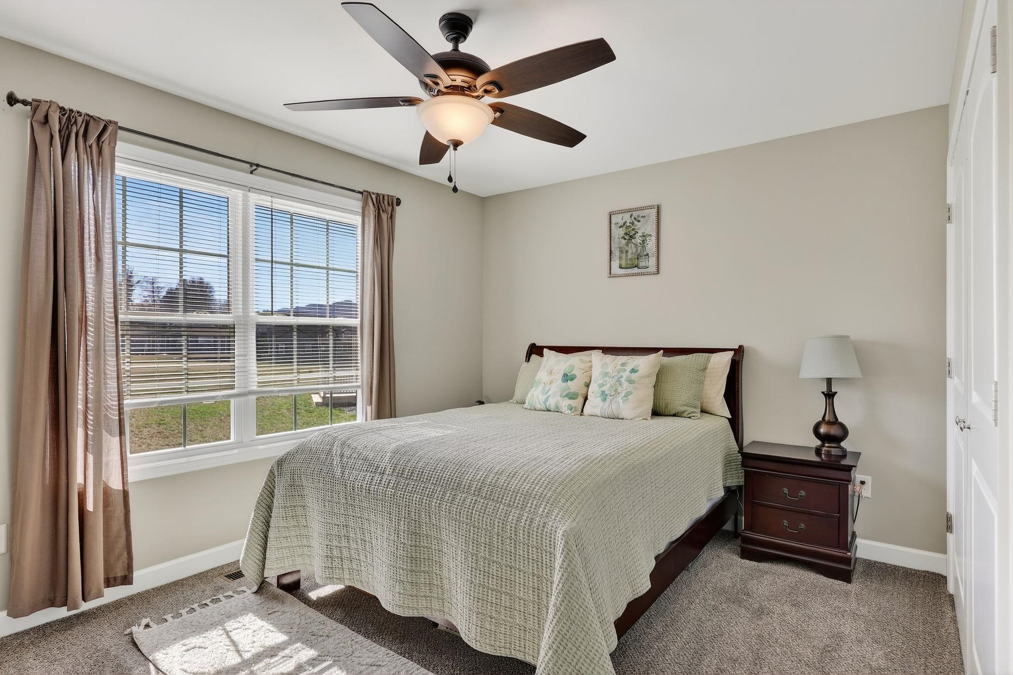 235 Locustdale Loop Shenandoah, VA 22849 - Photo 5 of 30 a bedroom with a bed and a window