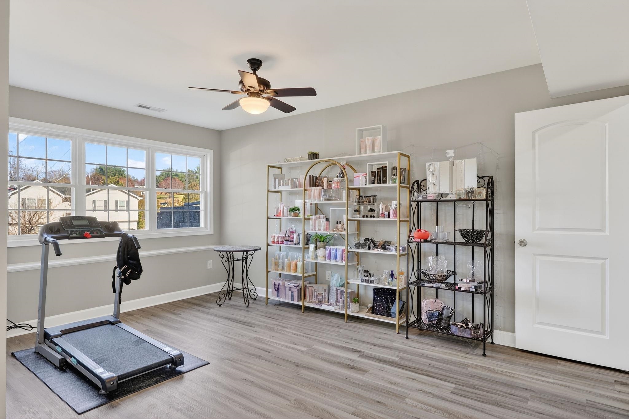 235 Locustdale Loop Shenandoah, VA 22849 - Photo 8 of 30 a living room with lots of furniture and a book shelf