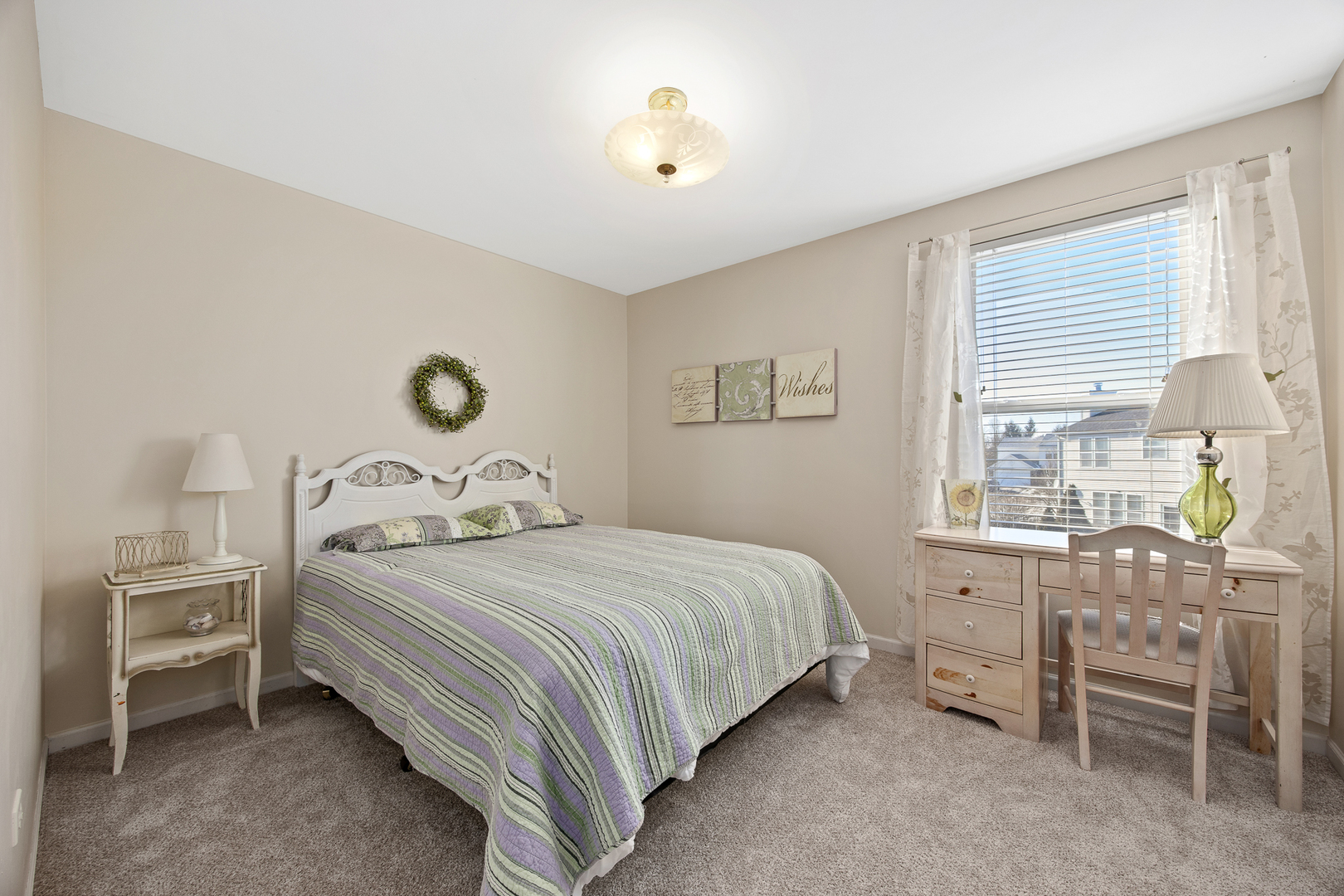 133 North Cranberry Street Bolingbrook, IL 60490 - Photo 30 of 46 a bedroom with a bed and a table