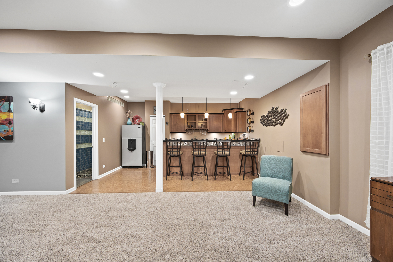 133 North Cranberry Street Bolingbrook, IL 60490 - Photo 34 of 46 a living room with stainless steel appliances kitchen island furniture and a kitchen view