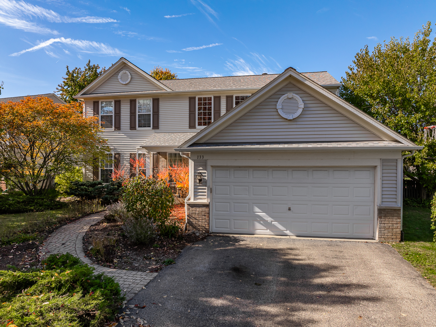 133 North Cranberry Street Bolingbrook, IL 60490 - Photo 46 of 46 a front view of a house with a yard and garage