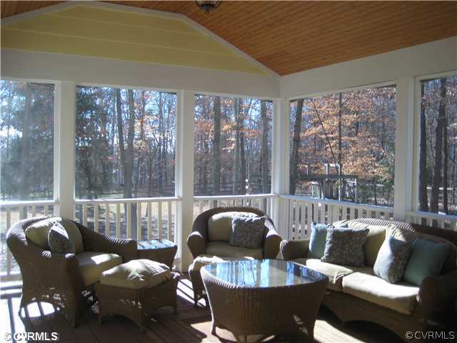 14471 Chepstow Road Midlothian, VA 23113 - Photo 10 of 12 a living room with furniture and a large window