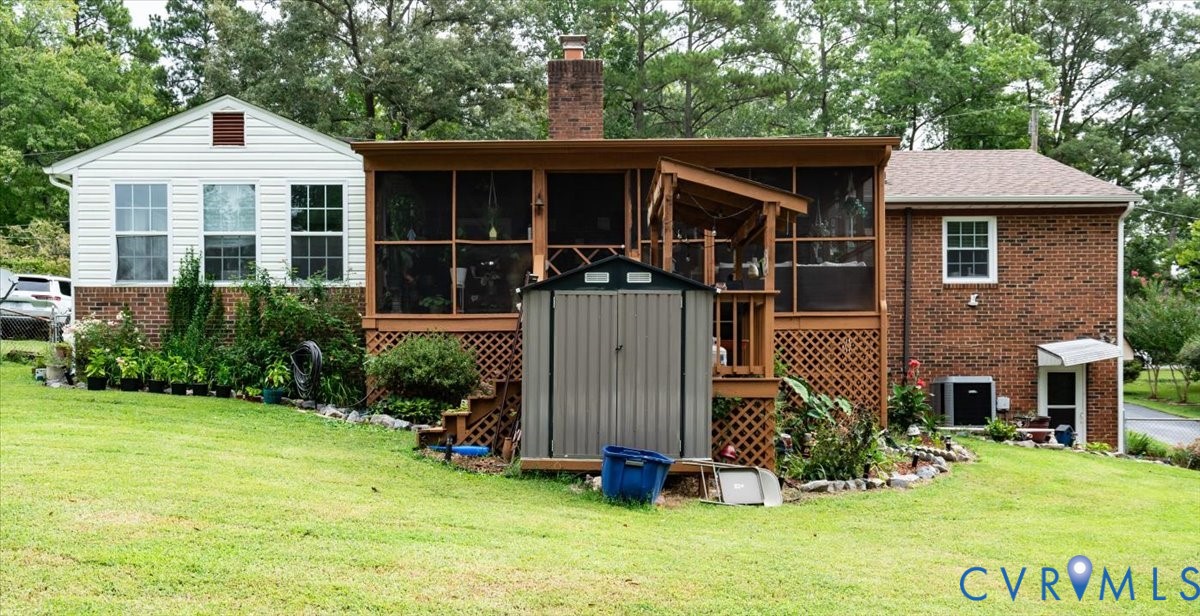 5510 Alberta Road Chesterfield, VA 23832 - Photo 29 of 29 Brick and siding exterior with a screened porch, e