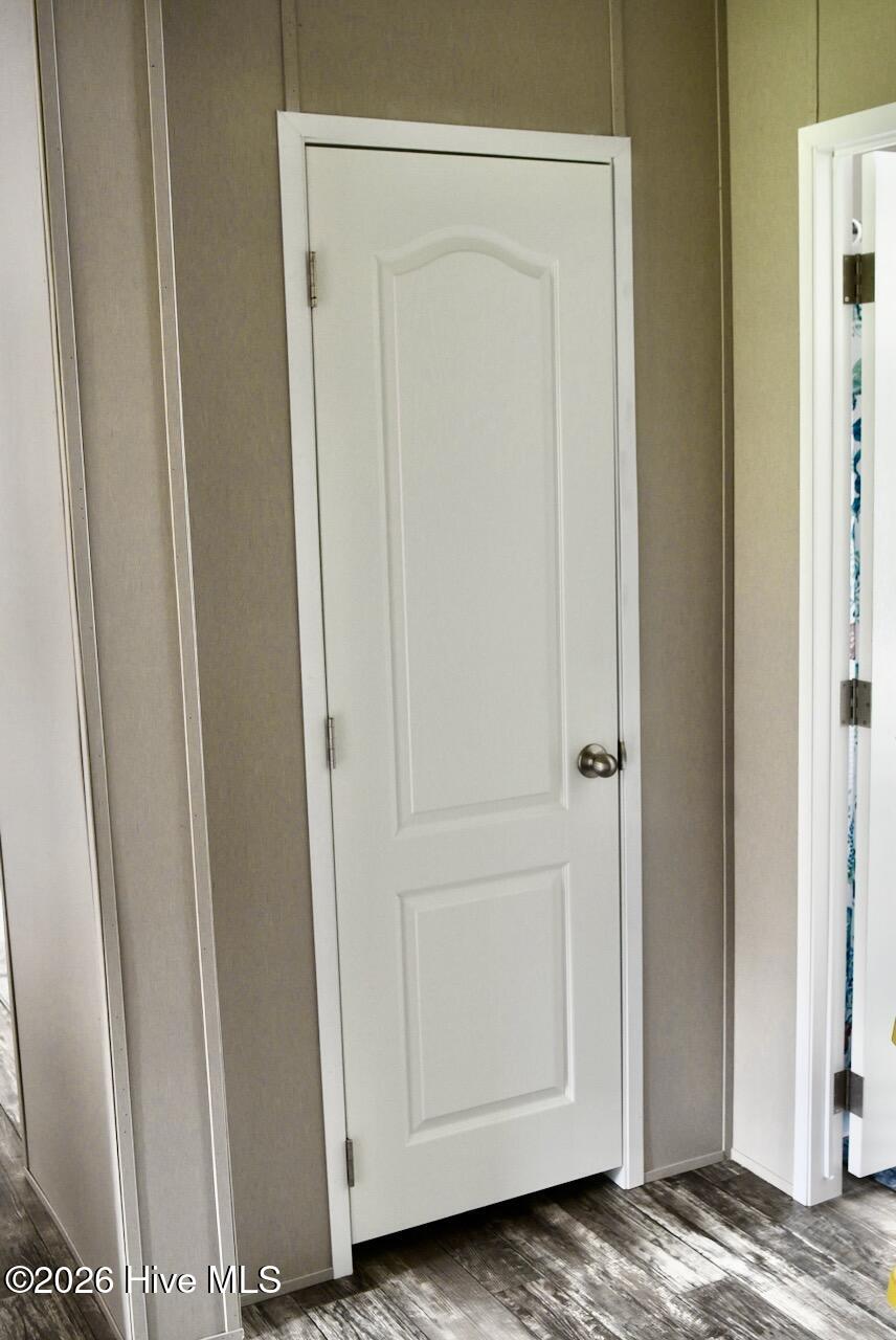 1430 Nixonton Road Elizabeth City, NC 27909 - Photo 27 of 30 The linen closet is in the hall wall between bathroom #2 and the 2 additional bedrooms.
