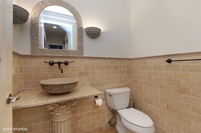1055 Cherokee Road Wilmette, IL 60091 - Photo 11 of 25 a bathroom with a toilet and a mirror