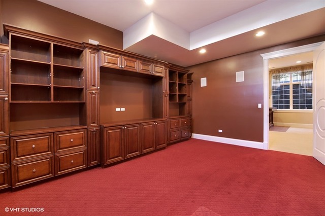 1055 Cherokee Road Wilmette, IL 60091 - Photo 23 of 25 a view of an empty room with cabinet and a window