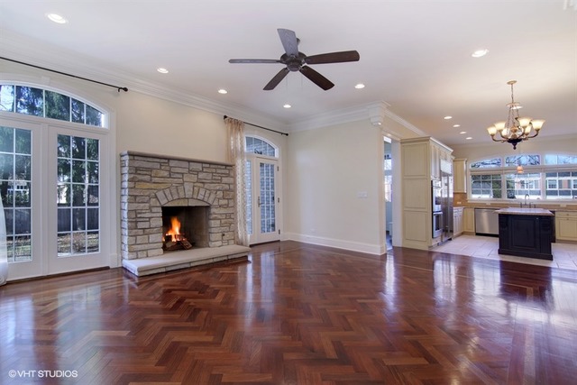 1055 Cherokee Road Wilmette, IL 60091 - Photo 6 of 25 a living room with furniture or wooden floor and a fireplace