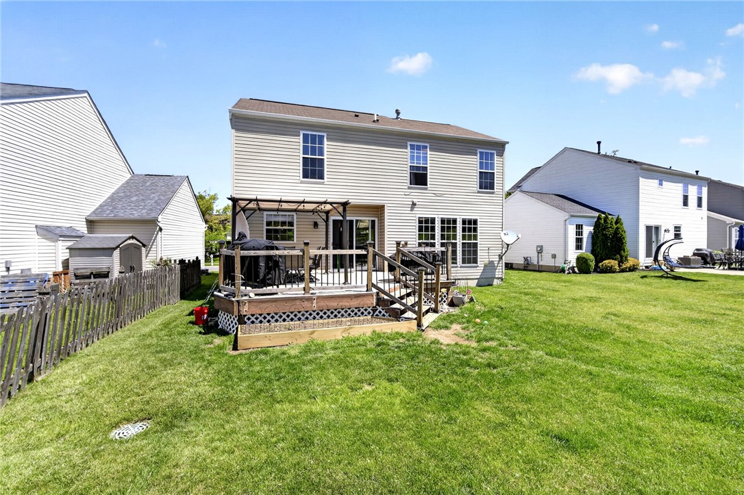 39 Holly Court Springboro, OH 45066 - Photo 35 of 42 This residence features a spacious backyard with a private deck, perfect for outdoor enjoyment.