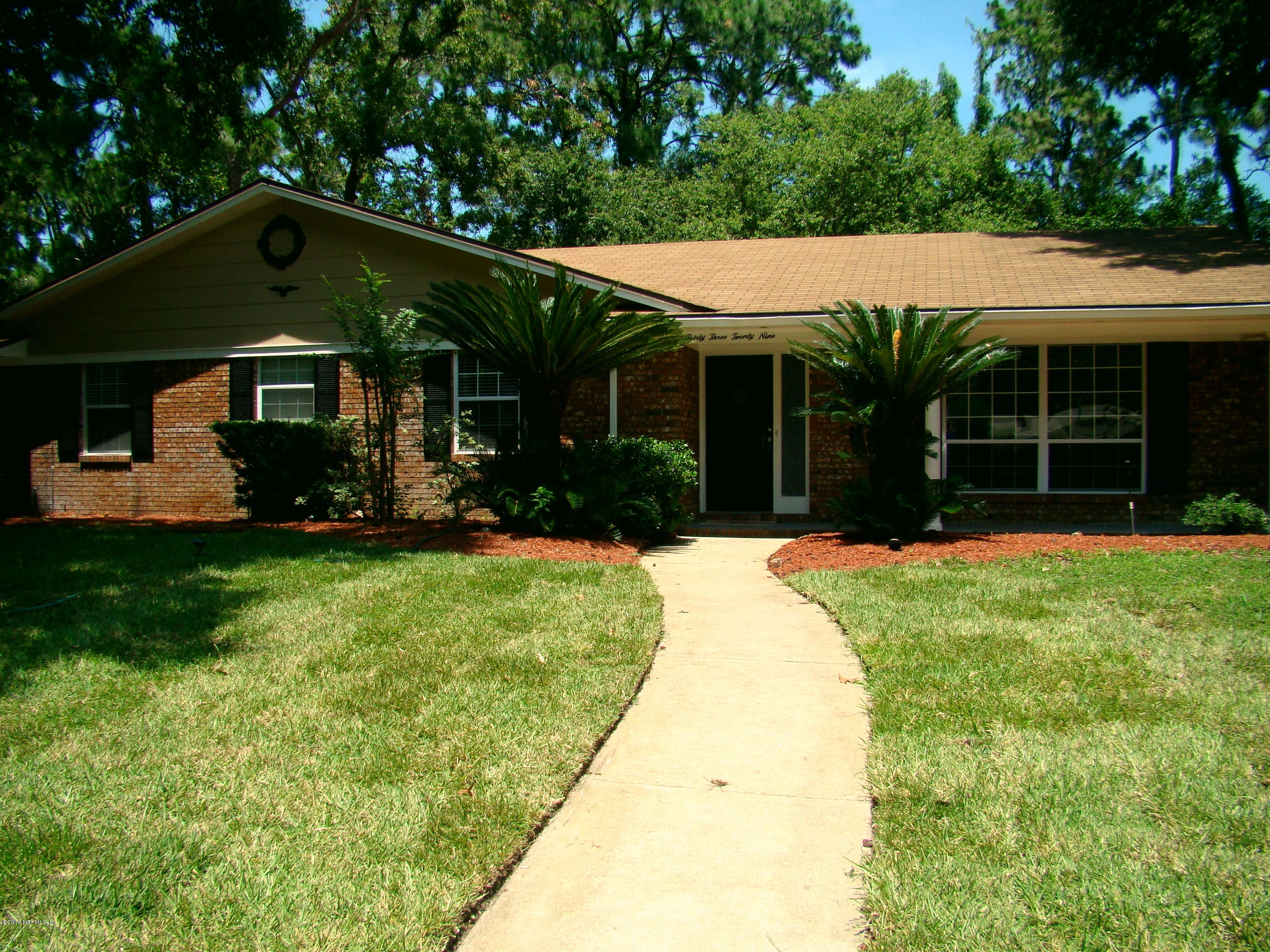 3329 Debussy Road Jacksonville, FL 32277 - Photo 1 of 28 FRONT