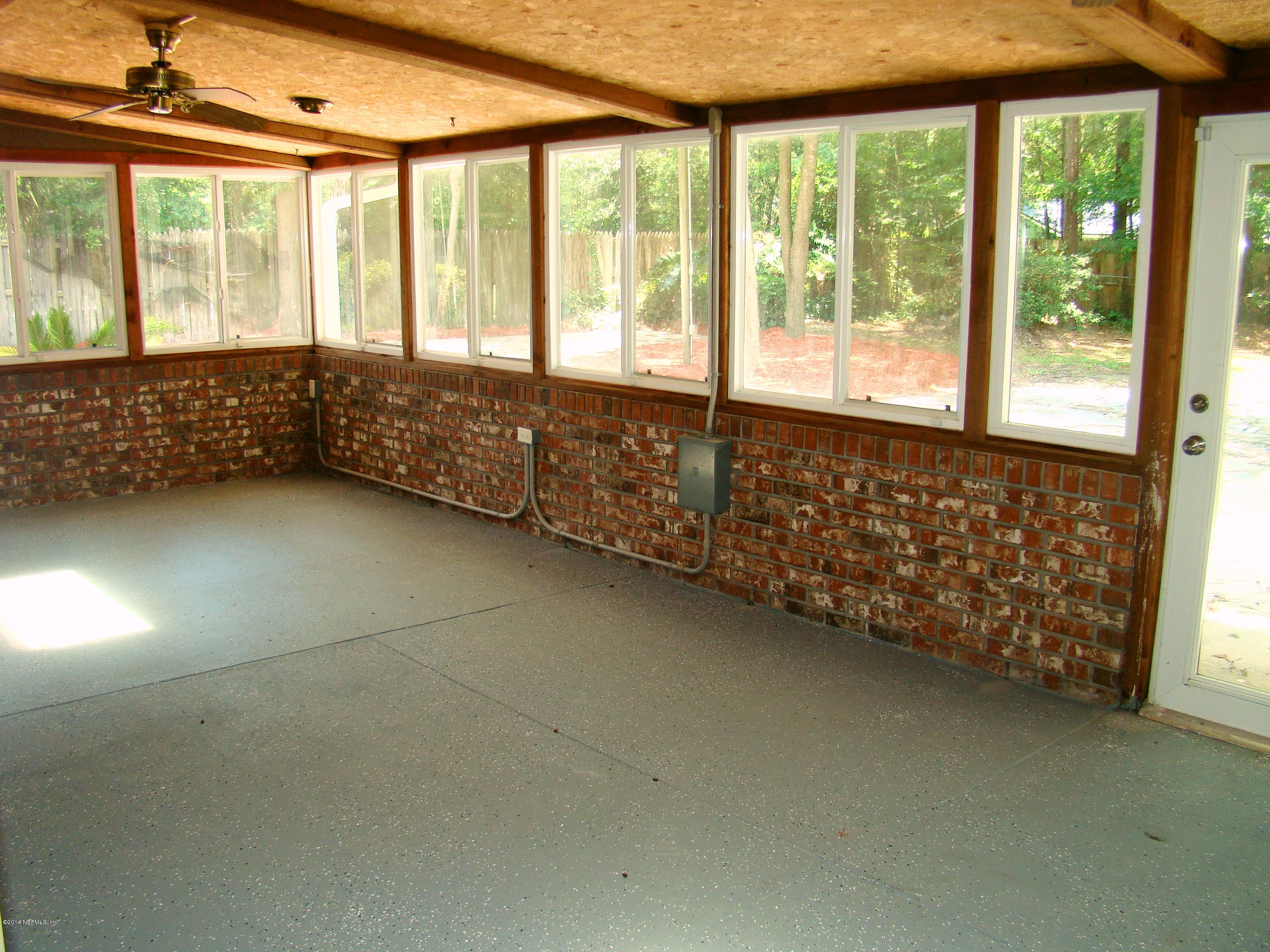 3329 Debussy Road Jacksonville, FL 32277 - Photo 16 of 28 ENCLOSED FLORIDA ROOM VIEW 1